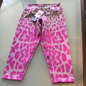 Pink sun. Woman’s legging Capri animal print pink gray extra small